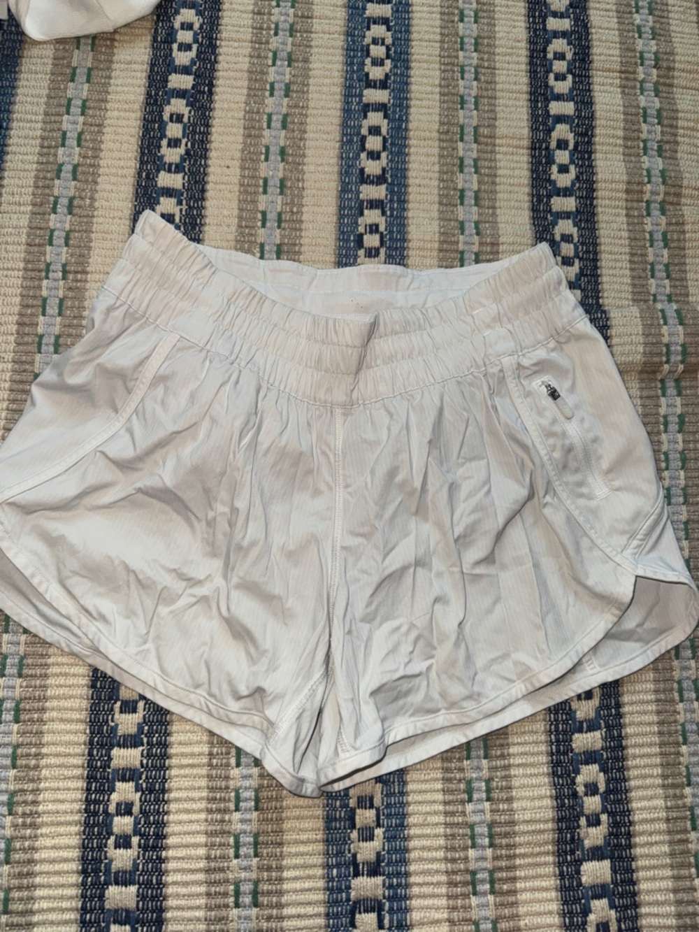 lululemon athletica white athletic shorts with zip pocket